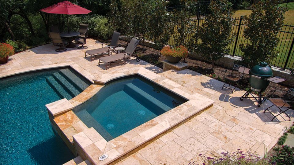 A Guide to Outdoor Overlays: Why Limestone & Quartz Stay Cool in Summer