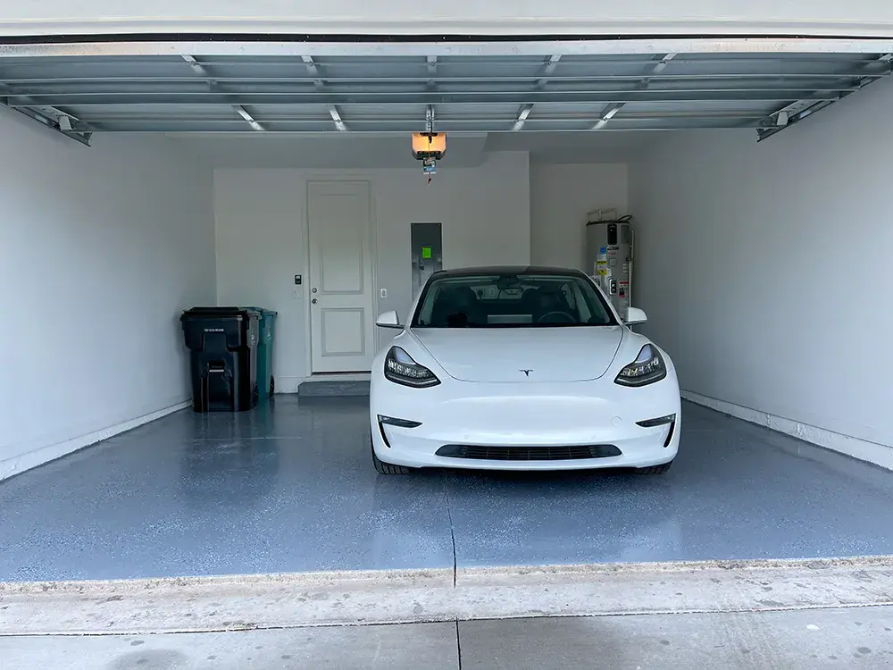 gray epoxy finish with blue paint garage floor